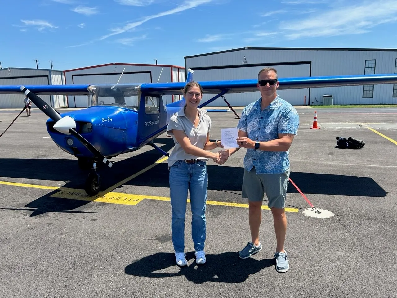 Pilot Rise student after a checkride with a DPE near Dallas–Fort Worth