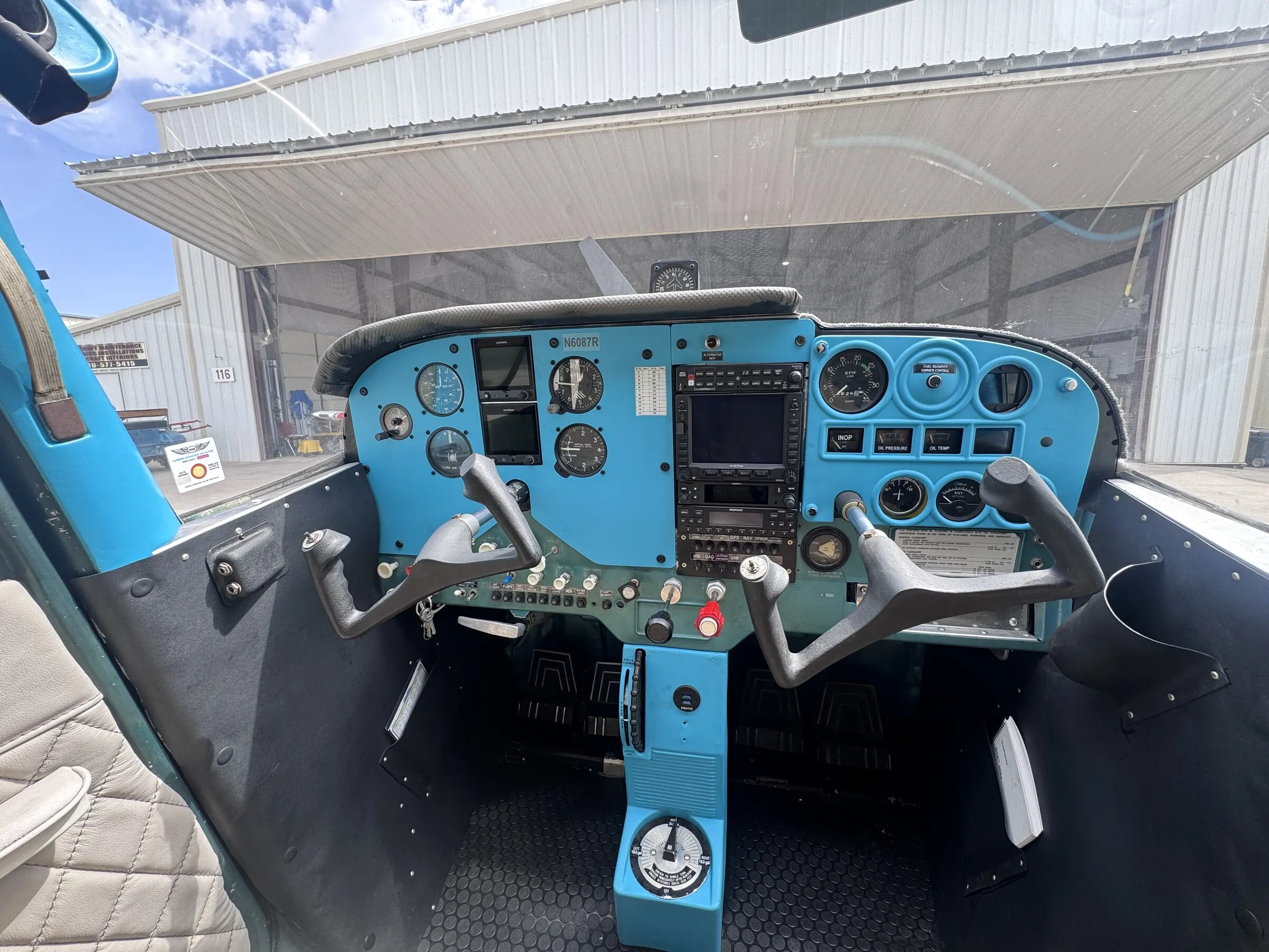 Wide cockpit and instrument panel view inside Cessna 172G N6087R
