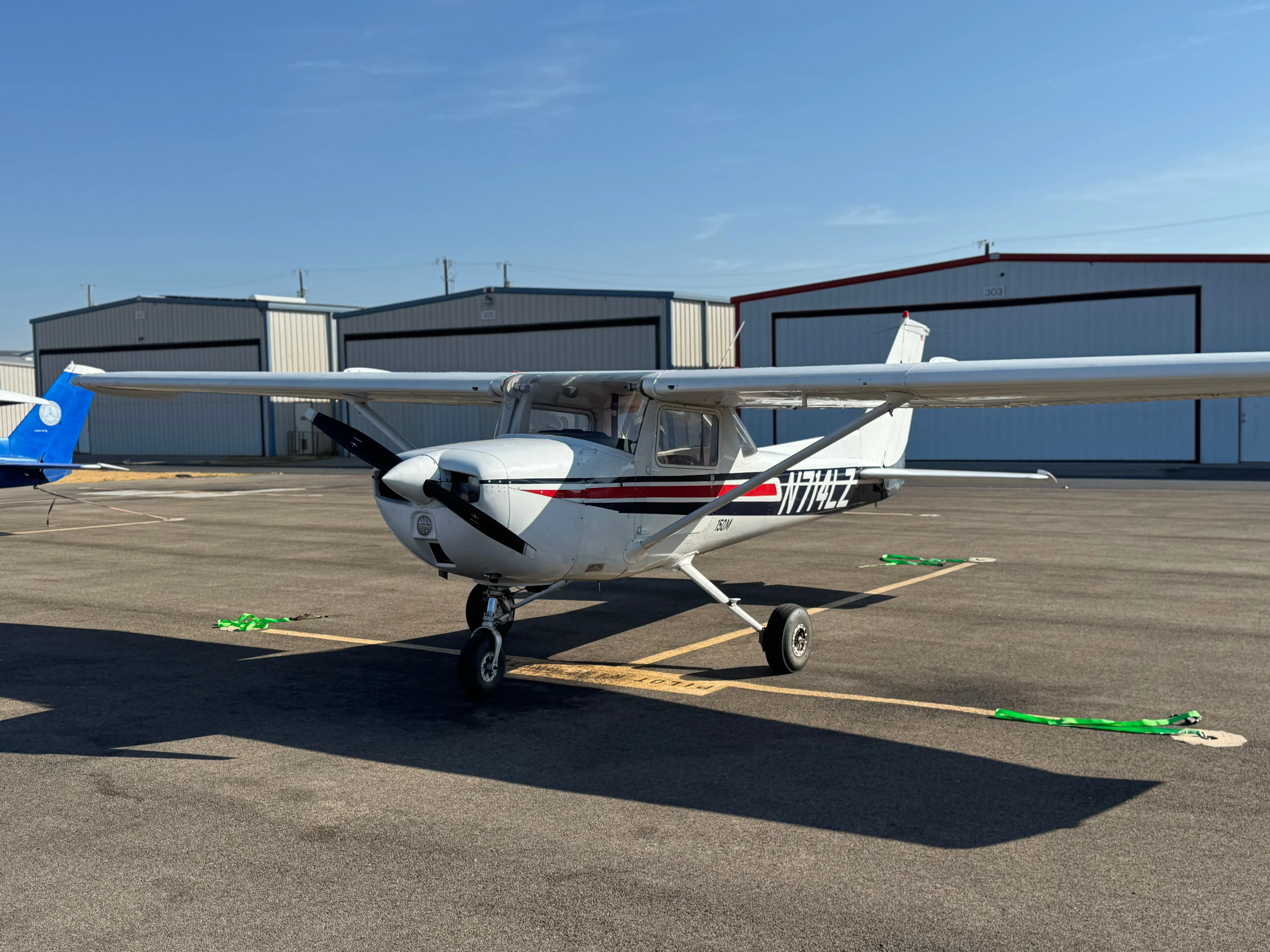 Front exterior view of Pilot Rise Cessna 150M N714LZ Scout