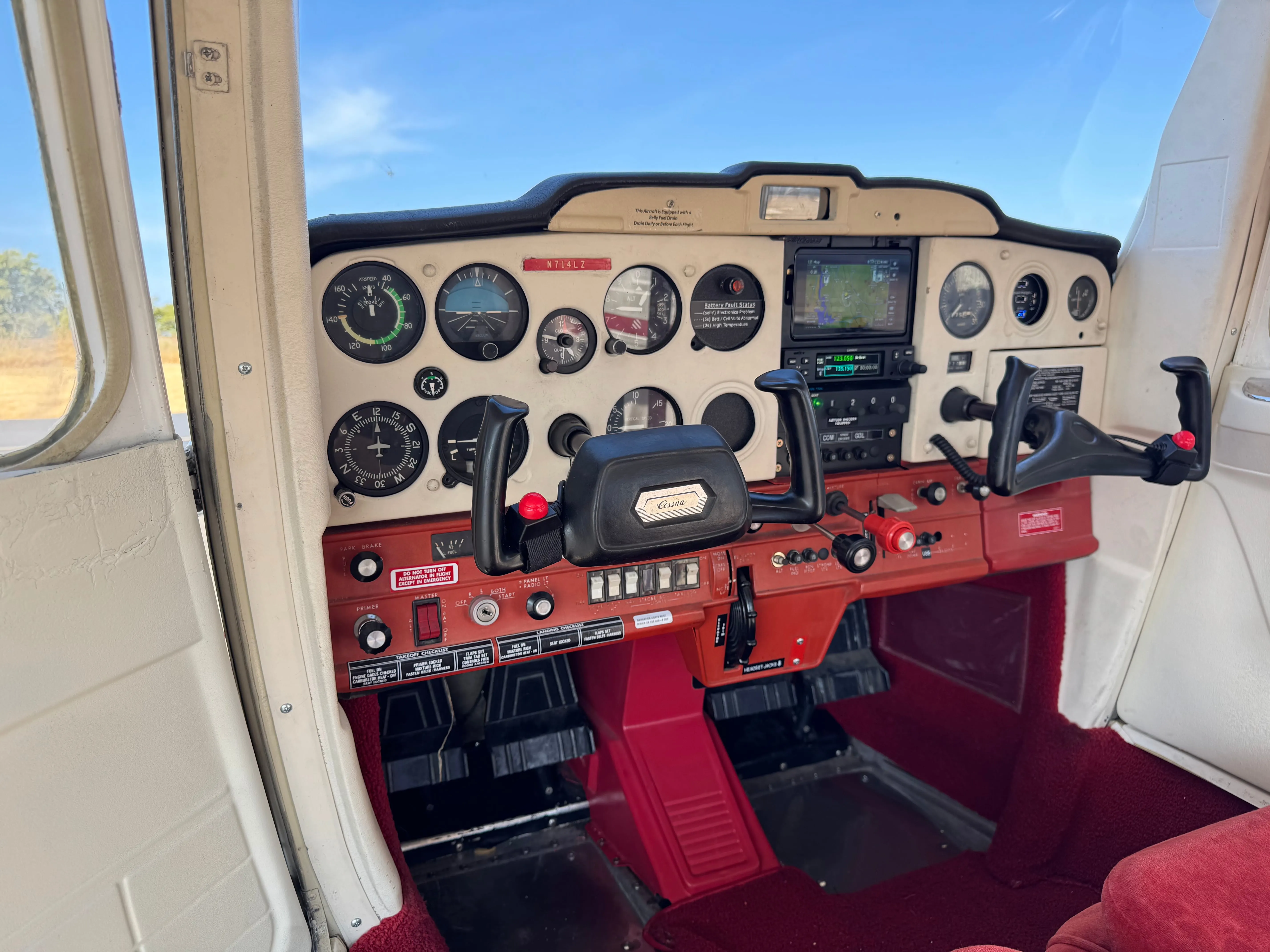 Angled instrument panel view inside Cessna 150M N714LZ Scout
