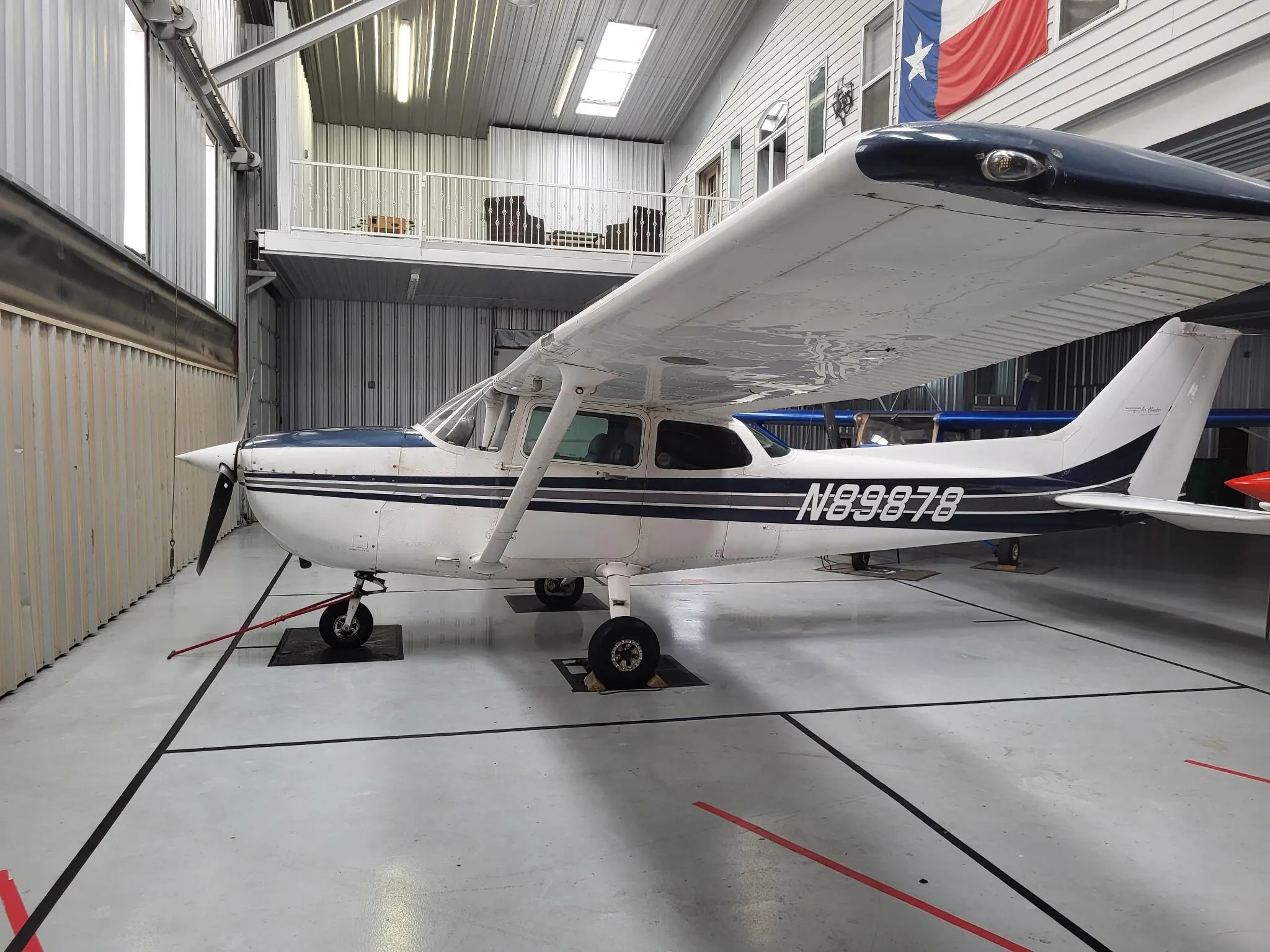 Cessna 172 N89878 hangared for Collin first solo milestone