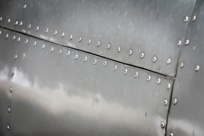 Unpainted aircraft rivets